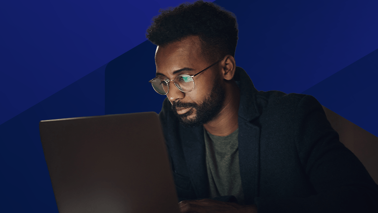 man staring a a computer screen